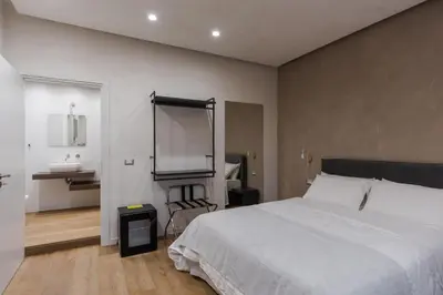 Letto o letti in una camera di Tropicalia Suites by Wonderful Italy