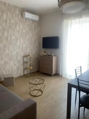 TV o dispositivi per l'intrattenimento presso Etna Guest House