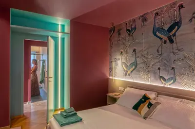 Letto o letti in una camera di Drea Acitrezza Luxury Home