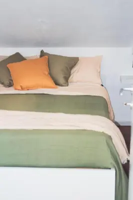 Letto o letti in una camera di La mansardina sul mare - Mascali