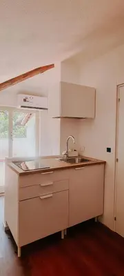 Cucina o angolo cottura di La mansardina sul mare - Mascali