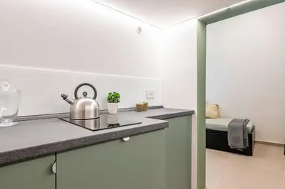 Cucina o angolo cottura di GuestHost - Central and Bright Apartment Catania