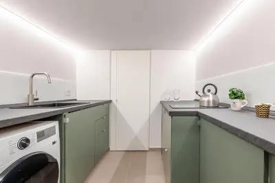 Cucina o angolo cottura di GuestHost - Central and Bright Apartment Catania