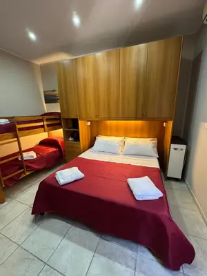 Letto o letti in una camera di A Traversa Rooms