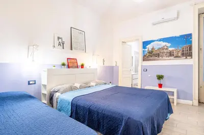 Letto o letti in una camera di GuestHost - Central apartment Caronda street