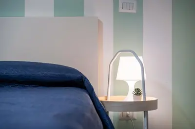 Letto o letti in una camera di GuestHost - Central apartment Caronda Compact