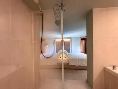 Letto o letti in una camera di Juliet Suites I