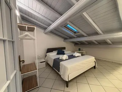 Letto o letti in una camera di Mythos Home