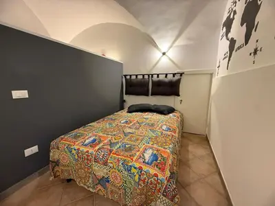 Letto o letti in una camera di La Casetta Indipendente