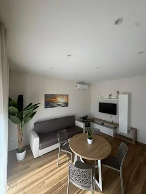 Area soggiorno di SICILIA FIERA Apartment