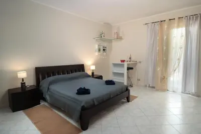 Letto o letti in una camera di Appartamento Le Palme Tra Taormina e Catania