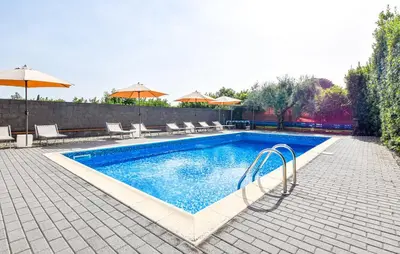 Piscina di Appartamento Le Palme Tra Taormina e Catania o nelle vicinanze