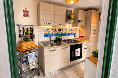 Cucina o angolo cottura di Villa Storica Etna & Mare Sicily Home - Aci Bonaccorsi