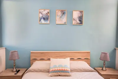 Letto o letti in una camera di ALMA Catania
