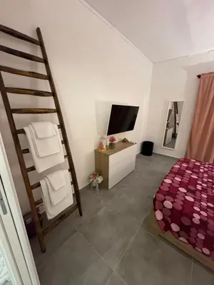 Letto o letti in una camera di Home i Due Obelischi