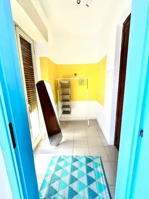 Letto o letti in una camera di Dipinto di Blu - Faraglioni Seaside Retreat