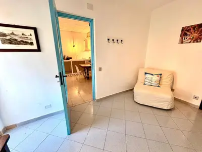 Area soggiorno di Dipinto di Blu - Faraglioni Seaside Retreat