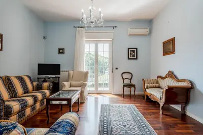 Area soggiorno di GuestHost - Trecastagni Elegant & Comfy Apartment