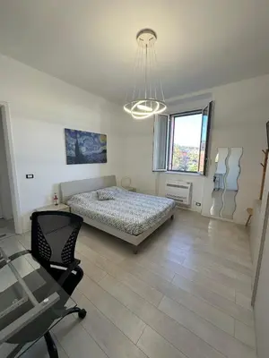 Area soggiorno di Lumi Home - ApartHotel Bentivoglio
