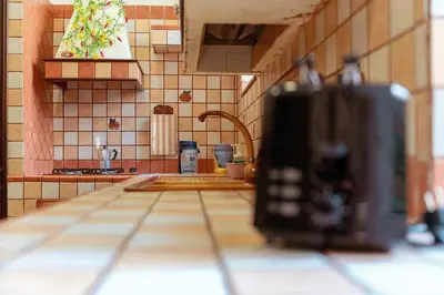 Cucina o angolo cottura di Monserrato House