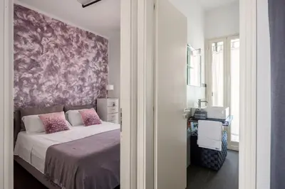 Letto o letti in una camera di FraLuci ai Faraglioni
