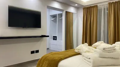 Letto o letti in una camera di Coco Noir Luxury Villa