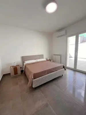 Letto o letti in una camera di Casa Dea