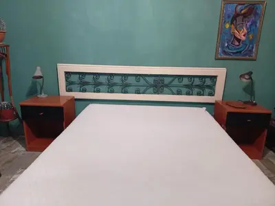 Letto o letti in una camera di Ai 4 gatti