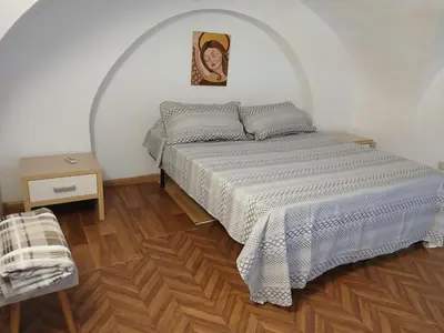 Letto o letti in una camera di Tri-na-krì-a
