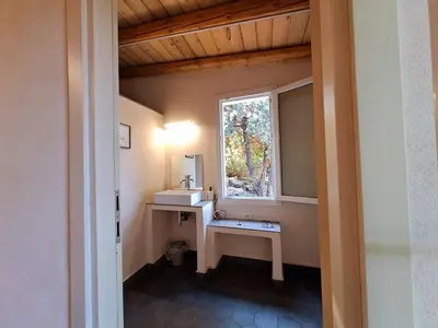 Letto o letti in una camera di Ilice tiny house
