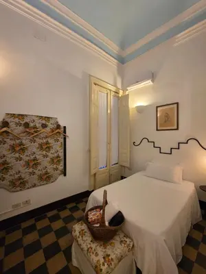 Letto o letti in una camera di Suite Fera 'O Luni