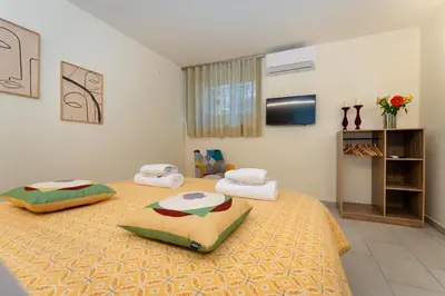 Letto o letti in una camera di Biro's Home Catania