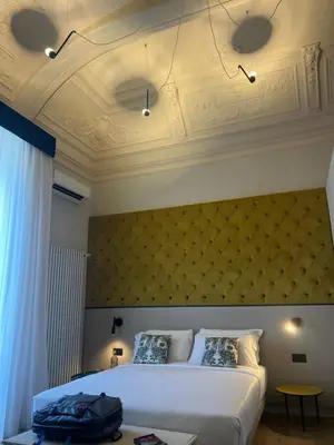 Letto o letti in una camera di Belduomo Catania Rooms & Flat