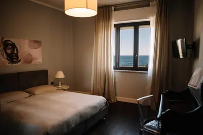 Letto o letti in una camera di B&B Hotei