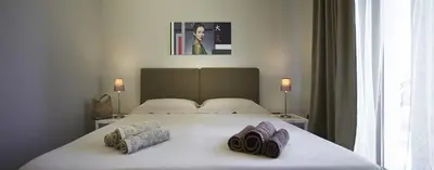 Letto o letti in una camera di B&B Hotei