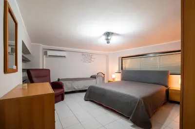 Letto o letti in una camera di House Italia