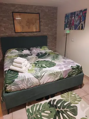 Letto o letti in una camera di Giardino d'Estate - Villa con piscina