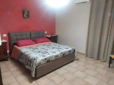 Letto o letti in una camera di Giardino d'Estate - Villa con piscina