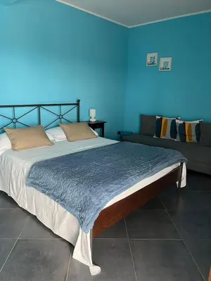 Letto o letti in una camera di B&B Terrazza dell'Etna