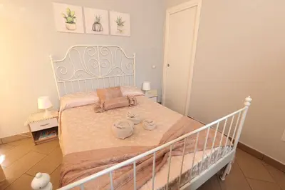Letto o letti in una camera di U Casteddu Home Motta Sant'Anastasia 1