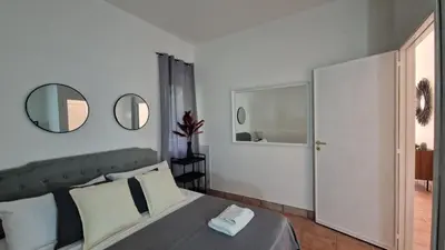 Letto o letti in una camera di Maison La Scogliera