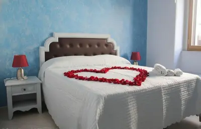 Letto o letti in una camera di Cavour Rooms