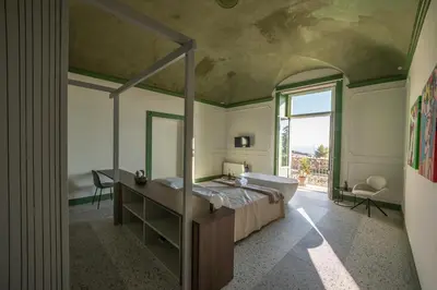 Letto o letti in una camera di Des Bains Acireale