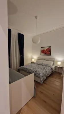 Letto o letti in una camera di Aosta apartment, to always feel at home