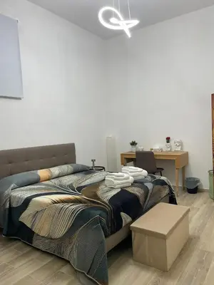 Letto o letti in una camera di Salinelle Home