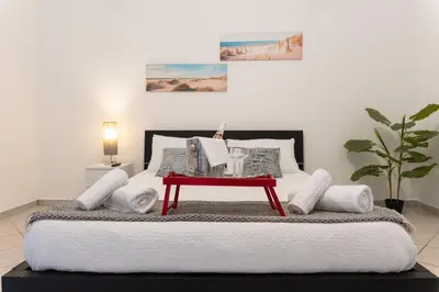 Letto o letti in una camera di Niùra House