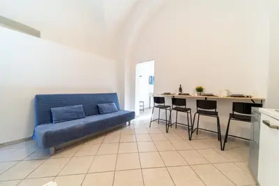 Area soggiorno di Niùra House