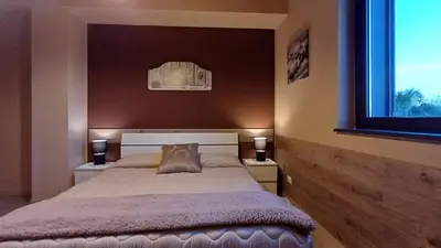 Letto o letti in una camera di Profumo di Zagara Acireale