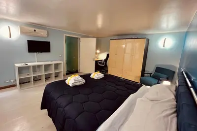 Letto o letti in una camera di Grazioso bilocale Catania centro vicino stazione