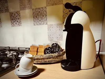 Set per la preparazione di tè e caffè presso Grazioso bilocale Catania centro vicino stazione